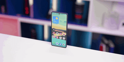A Cell Phone Displays The Time As 4:20 On The Screen GIF