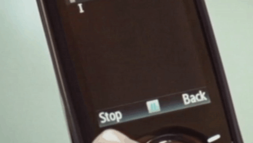 A Cell Phone With The Words " It 'S Over " On The Screen GIF