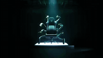 A Chair With A Razer Logo On It Is Surrounded By Monsters GIF