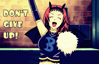A Cheerleader In A Bat Costume With The Words " Do N't Give Up " Written On The Bottom GIF