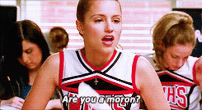 A Cheerleader Says " Are You A Moron " While Wearing A Hs Uniform GIF