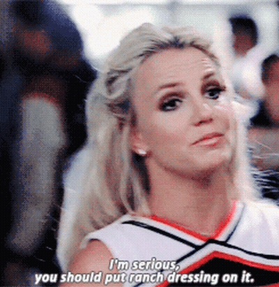 A Cheerleader Says " I 'M Serious " And " You Should Put Ranch Dressing On It " GIF