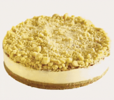 A Cheesecake With A Crumb Topping On Top Of It GIF