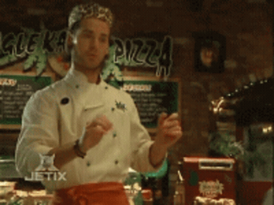 A Chef In Front Of A Sign That Says Glekarma GIF