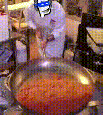 A Chef Is Stirring A Pan Of Sauce With A Smiley Face Drawn On His Head GIF