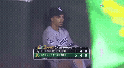 A Chicago White Sox Baseball Player Sits In The Dugout During A Game Against The Oakland Athletics GIF