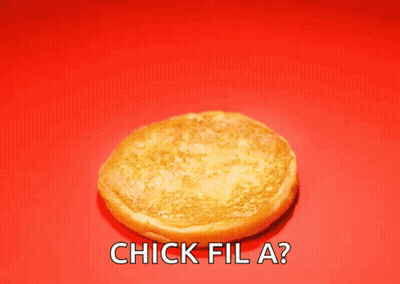 A Chick Fil A Sandwich Is On A Red Background GIF
