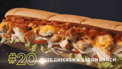 A Chicken And Bacon Ranch Sub Sandwich With The Number 20 On The Bottom GIF
