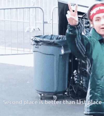 A Child Giving A Peace Sign With The Words Second Place Is Better Than Last Place GIF