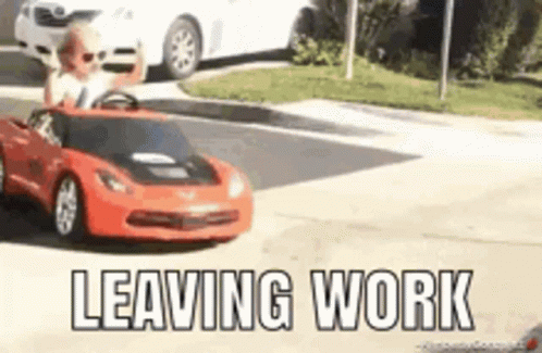 A Child Is Driving A Red Toy Car On A Street With The Words Leaving Work Below It . GIF