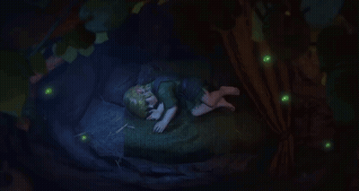 A Child Is Sleeping Under A Tree With Glowing Green Lights Around GIF