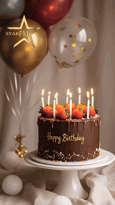 A Chocolate Birthday Cake With Strawberries And Candles Is On A Cake Stand GIF