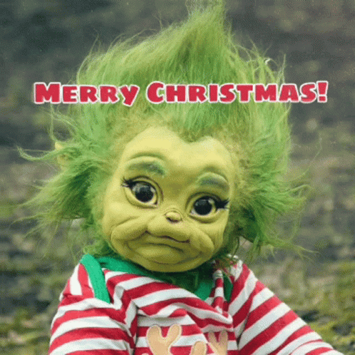 A Christmas Card With A Grinch With Green Hair GIF