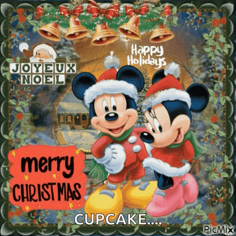 A Christmas Card With Mickey Mouse And Minnie Mouse GIF