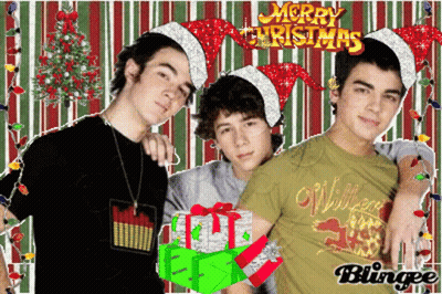 A Christmas Card With Three Boys Wearing Santa Hats GIF