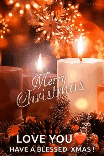 A Christmas Card With Two Lit Candles And The Words `` Merry Christmas Love You Have A Blessed Christmas '' . GIF