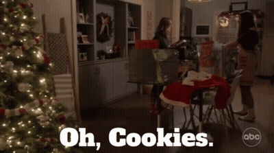 A Christmas Scene With A Box That Says Oh Cookies On It GIF