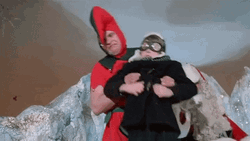 A Christmas Story Elves Throw Ralphie To Slide GIF