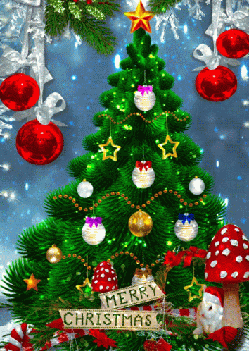 A Christmas Tree Has A Sign That Says Merry Christmas GIF