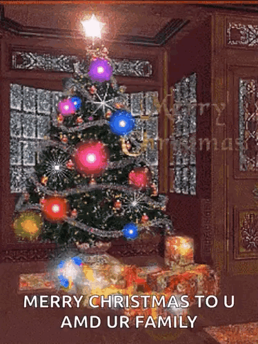 A Christmas Tree In A Living Room With The Words Merry Christmas To U And Ur Family GIF