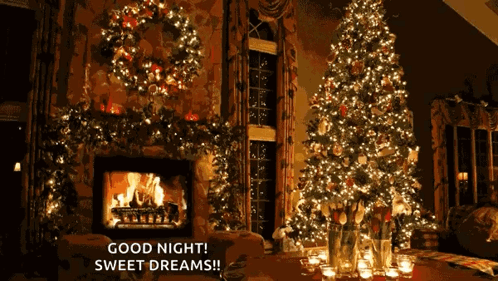 A Christmas Tree Is Lit Up In A Living Room GIF