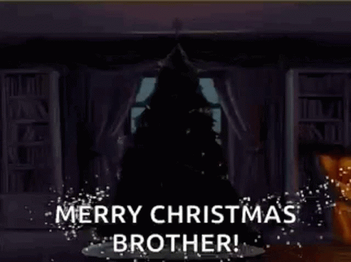 A Christmas Tree Made Out Of Lettuce Is On A Plate In A Room . GIF