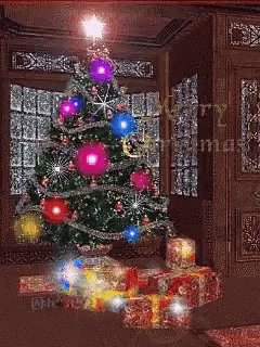 A Christmas Tree With Gifts Underneath It And The Words Merry Christmas GIF