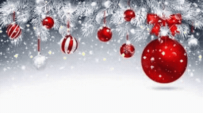 A Christmas Tree With Red And White Christmas Decorations Hanging From It . GIF