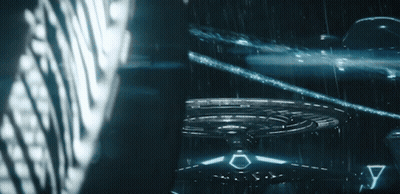 A Circular Object With A Triangle On The Bottom Of It GIF