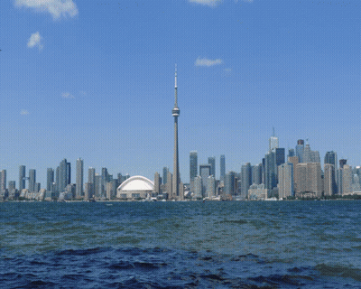 A City Skyline With The Cn Tower In The Middle GIF