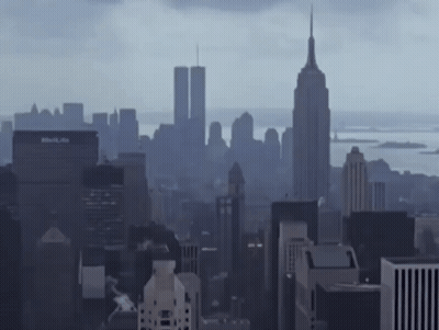 A City Skyline With The Empire State Building In The Background GIF