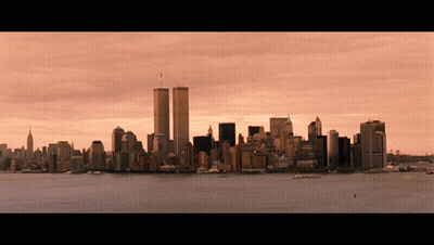 A City Skyline With The Twin Towers In The Middle GIF