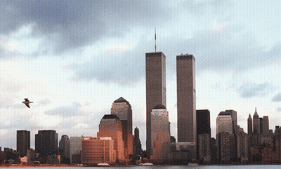 A City Skyline With The Twin Towers In The Middle GIF