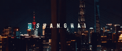 A City Skyline With The Word Shanghai In White Letters GIF