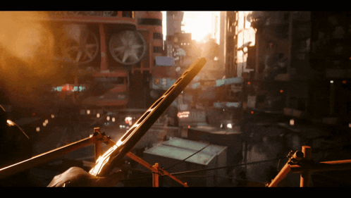 A Cityscape With A Sign That Says ' A Few Steps To Paradise ' On It GIF