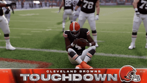 A Cleveland Browns Player Is Sitting On The Field GIF