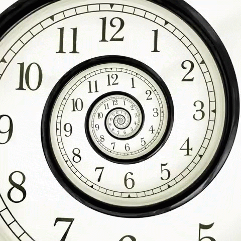 A Clock That Has The Hands On The Numbers 1 And 12 GIF