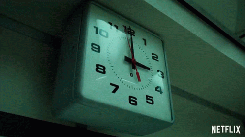A Clock That Has The Word Netflix On The Bottom GIF