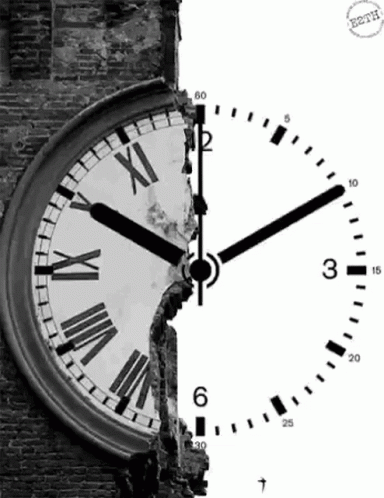 A Clock With Roman Numerals Is Broken In Half GIF