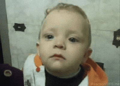 A Close Up Of A Baby Making A Funny Face . GIF