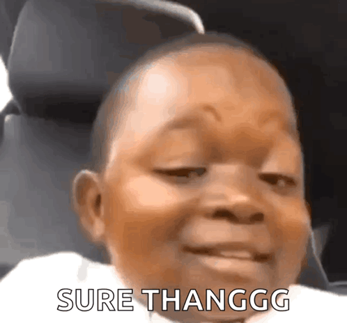A Close Up Of A Baby 'S Face With The Words Sure Thanggg Written Below It GIF