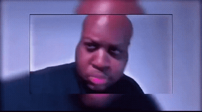 A Close Up Of A Bald Man 'S Face With A Blue Background Behind Him . GIF
