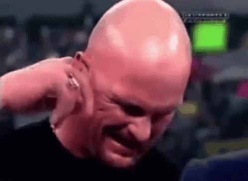 A Close Up Of A Bald Man 'S Face With A Green Screen In The Background . GIF