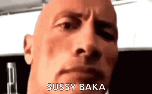 A Close Up Of A Bald Man 'S Face With The Words `` Sussy Baka '' Written Next To Him . GIF
