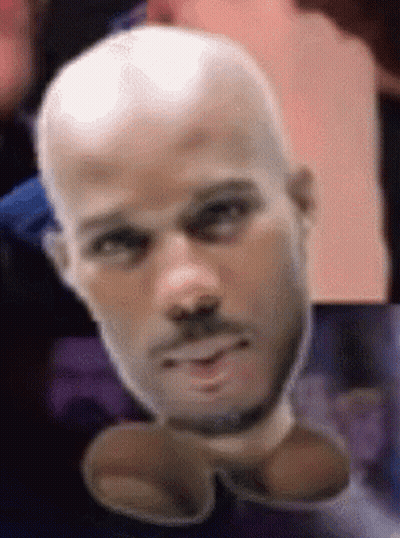 A Close Up Of A Bald Man 'S Head With A Beard GIF