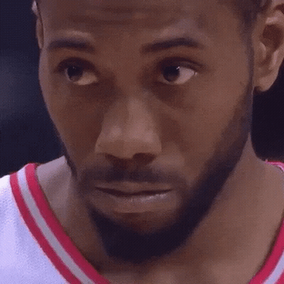 A Close Up Of A Basketball Player 'S Face With A Beard And A Smile . GIF