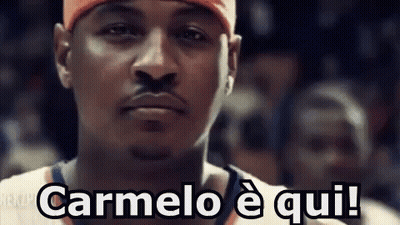 A Close Up Of A Basketball Player 'S Face With The Words Carmelo E Qui Written On It . GIF