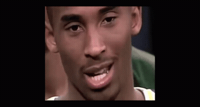 A Close Up Of A Basketball Player Talking Into A Microphone GIF