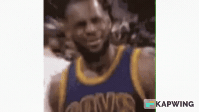 A Close Up Of A Basketball Player Wearing A Blue And Gold Uniform . GIF