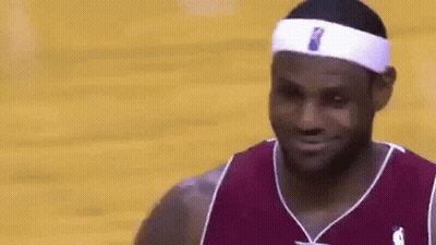 A Close Up Of A Basketball Player Wearing A Headband And Smiling On A Court . GIF